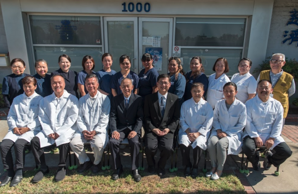 Staff photo in front of Tzu Chi Health Center Alhambra. Image source: https://tzuchimedical.us/